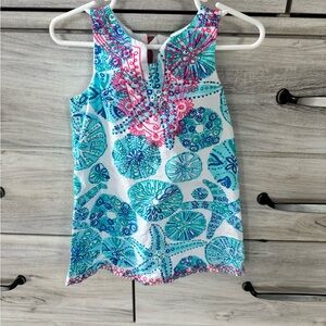 Vibrant Sleeveless Top with Floral Patterns